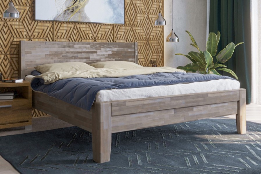 Robustná masívna posteľ Sion K1 bude dôstojnou dominantou vašej spálne, do ktorej prinesie útulnosť aj komfort.