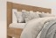 Anetta predstavuje vzdušnú elegantnú posteľ z masívu s vertikálne členeným hlavovým čelom.