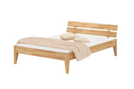 Nádherná, masívna posteľ z olejovaného dubového dreva. Na posteli nájdeme veľa prirodzených trhlín a nedostatkov , ktoré sa v dreve postupne objavujú.